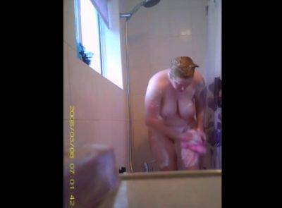 Redhead stepsister caught showering on hidden cam - voyeurhit.com